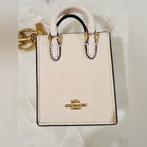 Coach Mini North South Bag Charm
Keychain in Chalk White, Gold
Hardware, New